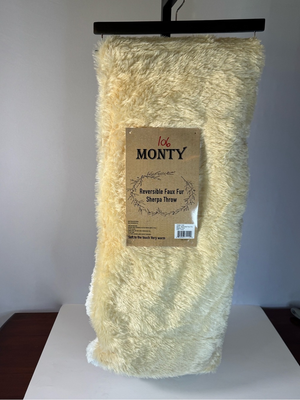 Monty Reversible Faux Fur Sherpa Throw in Cream